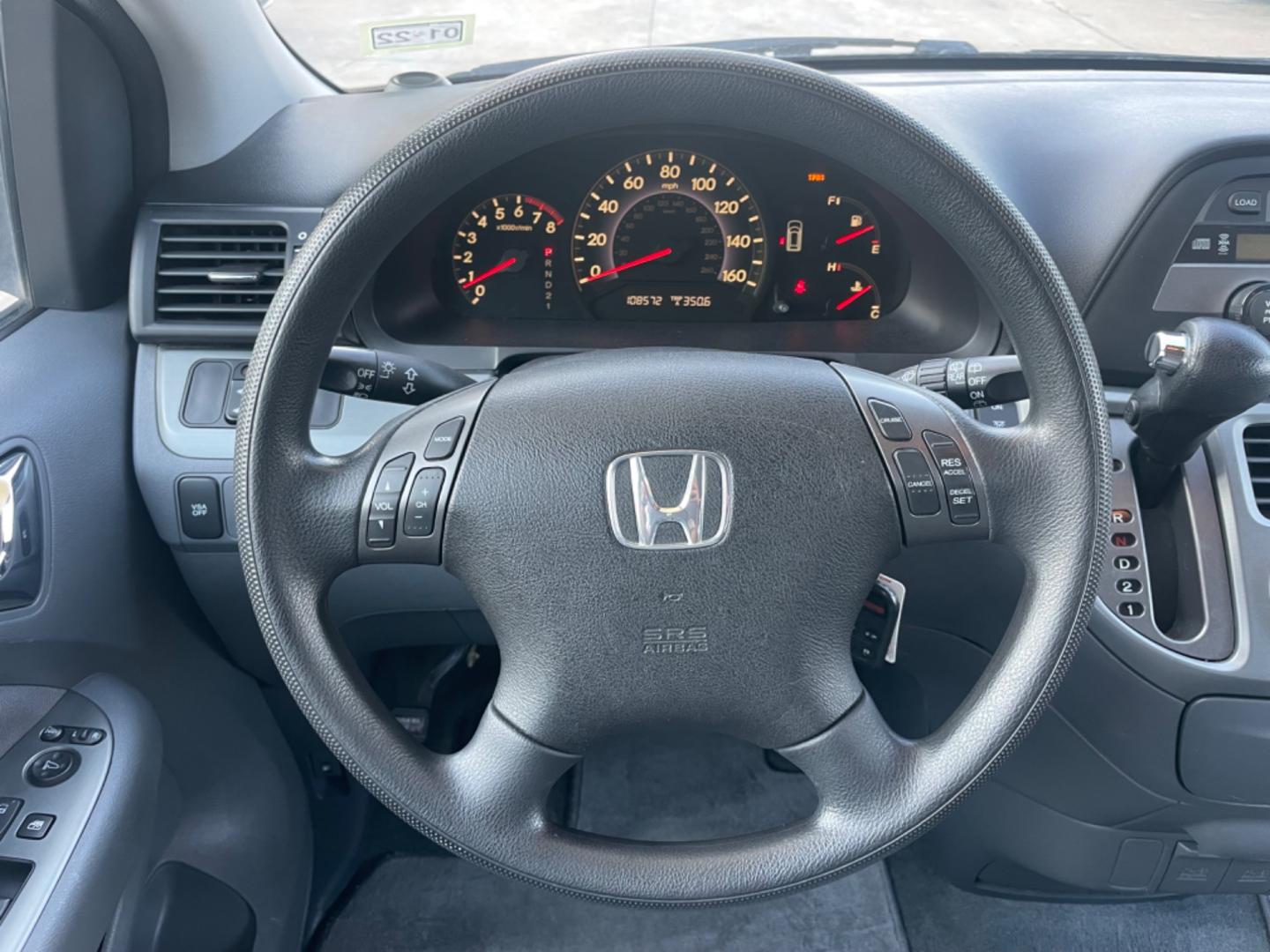 2007 Blue /Silver Honda Odyssey EX (5FNRL38457B) with an 3.5L V6 SOHC 24V engine, 5-Speed Automatic Overdrive transmission, located at 1501 West 15th St., Houston, 77008, (713) 869-2925, 29.797941, -95.411789 - Photo#12